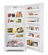 Open refrigerator with various food items on white background